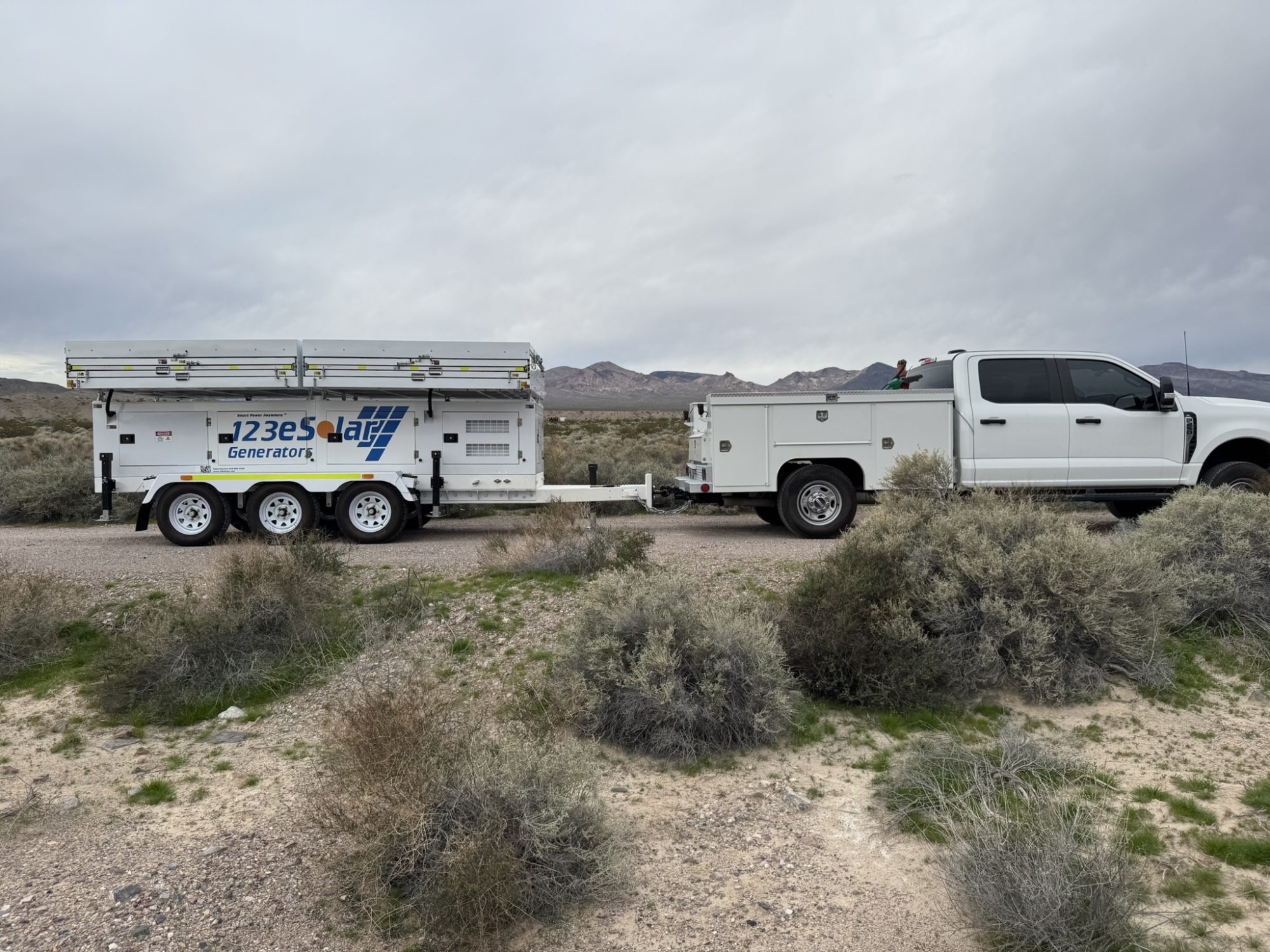 123-SG-7S82 — Ready to tow behind a standard service truck, the array folded down for the road.