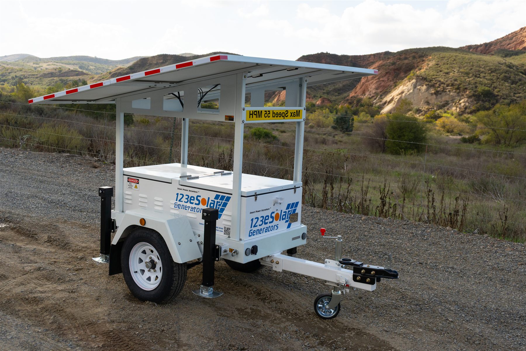 123-SG-900A10 — A fixed solar canopy over a compact single-axle trailer: 48 V DC power the moment it is parked.