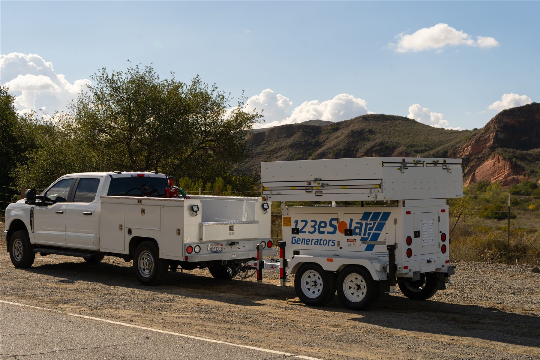 123-STG-42S51 — Tows behind a standard service pickup with the array stowed.