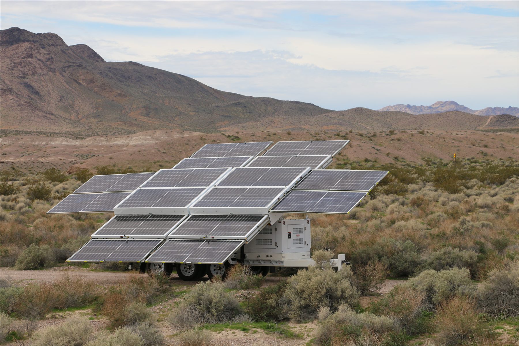 123-STG-71S62 — Sixteen panels fully open, producing 31.6 kWh on an average day.