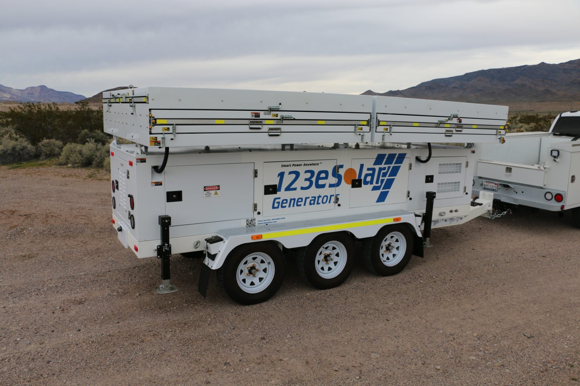 123-STG-72D62 — The Tri-Brid™ stowed: solar, lithium storage and a 10.8 kW diesel on one trailer.