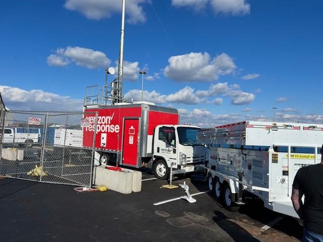 The Tri-Brid™ trailer parked beside the Verizon Response cell on wheels at MetLife Stadium